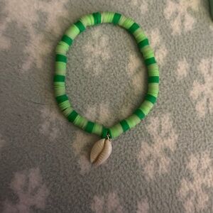 Set of 2 :Wrist Wonders Green Waves Pooka Shell Bracelets